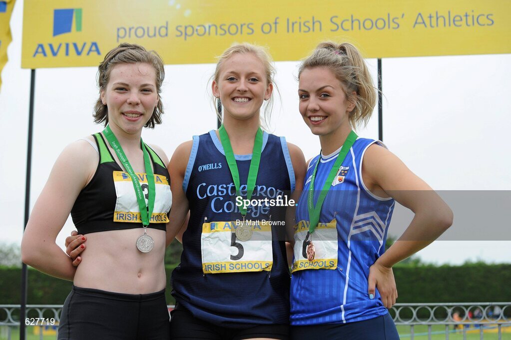 2 June 2012; Gold medal winner Sarah Lavin, centre, from Castletroy College, Co. Limerick, with second place Clar Ni Murchu, left, from Gaelcholaiste Ceartharlach, Carlow, and third place Lily Ann O'Hora, right, from Cresent Community College, Co. Limerick, after the Senior Girls 100m Hurdles at the Aviva All Ireland Schools’ Track and Field Championships 2012. Tullamore Harriers AC, Tullamore, Co. Offaly. Picture credit: Matt Browne / SPORTSFILE