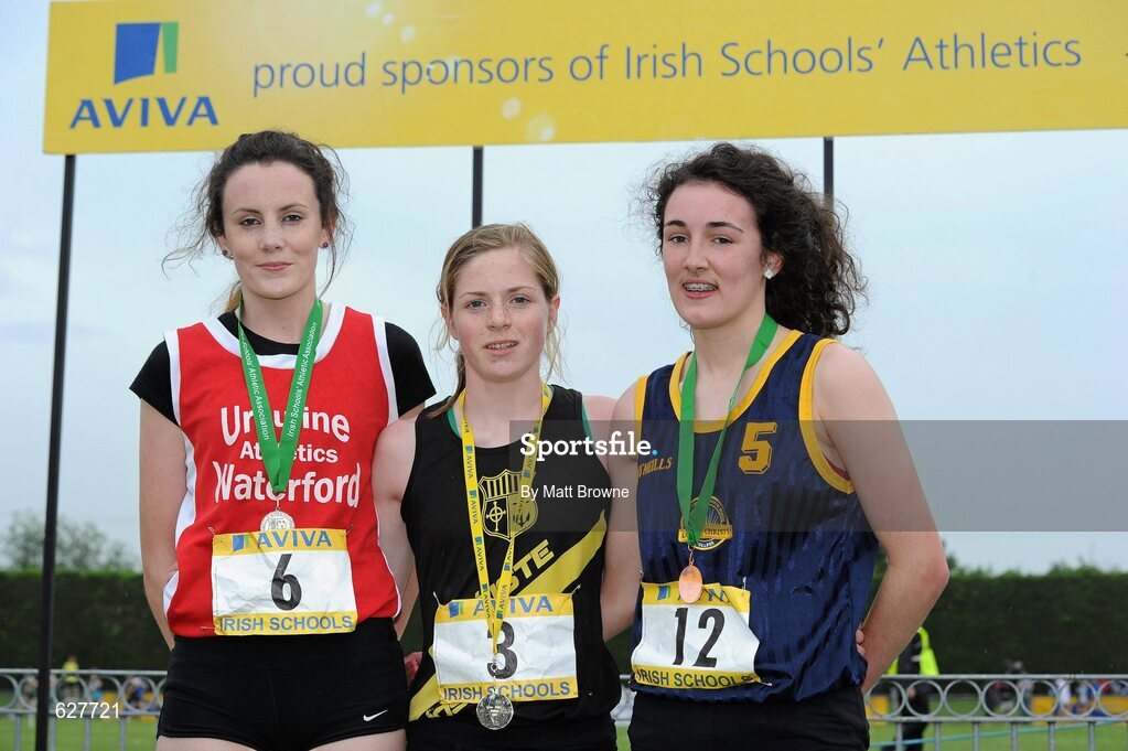 2 June 2012; Gold medal winner Siofra Clerigh Buttner, centre, from Coláiste Íosagáin, Dublin, with second place Aisling Quinn, left, and third place Amy Jackson, right, from Lumen Christi College, Co. Derry, after the Intermediate Girls 1500m at the Aviva All Ireland Schools’ Track and Field Championships 2012. Tullamore Harriers AC, Tullamore, Co. Offaly. Picture credit: Matt Browne / SPORTSFILE