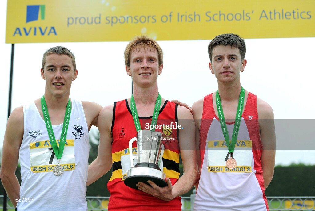 2 June 2012; Gold medal winner Kevin Dooney, centre, CBC Monkstown, Co. Dublin, with second place Ian Guidan, left, St Aidan's CBC, Dublin, and third place Andrew Monaghan, St Colman's College Newry, Co. Down, after the Senior Boys 5000m at the Aviva All Ireland Schools’ Track and Field Championships 2012. Tullamore Harriers AC, Tullamore, Co. Offaly. Picture credit: Matt Browne / SPORTSFILE