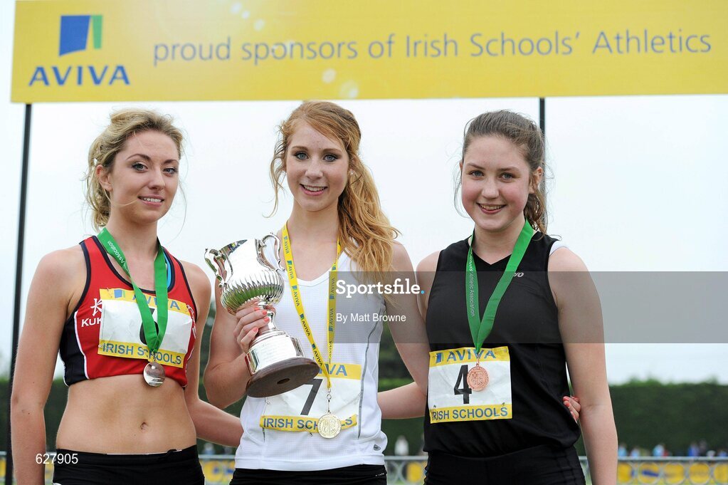 2 June 2012; Gold medal winner Lorna Fitzpatrick, centre, Sacred Heart Grammer School, Newry, Co. Down, with second place Amy O'Donoghue, left, Villiers School, Co. Limerick, and third place Chloe Doran, right, Holy Faith, Clontarf, Dublin, after the Senior Girls 1500m at the Aviva All Ireland Schools’ Track and Field Championships 2012. Tullamore Harriers AC, Tullamore, Co. Offaly. Picture credit: Matt Browne / SPORTSFILE