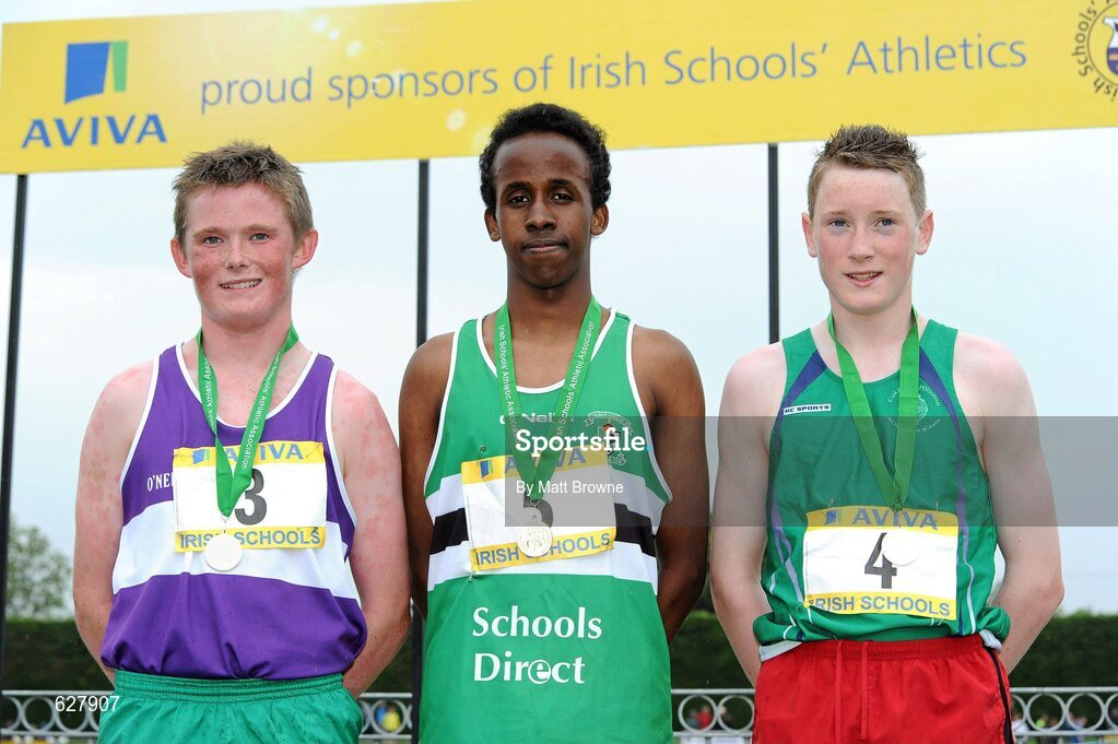2 June 2012; Gold medal winner Abdi Mohammed, centre, Chriost Ri Corcaigh, Co. Cork, with second place Jack O'Leary, left, Clongowes Wood College, Co. Westmeath, and third place Glen Gaffney, right, St Mary's Mullingar, Co. Westmeath, after the Junior Boys 1500m at the Aviva All Ireland Schools’ Track and Field Championships 2012. Tullamore Harriers AC, Tullamore, Co. Offaly. Picture credit: Matt Browne / SPORTSFILE