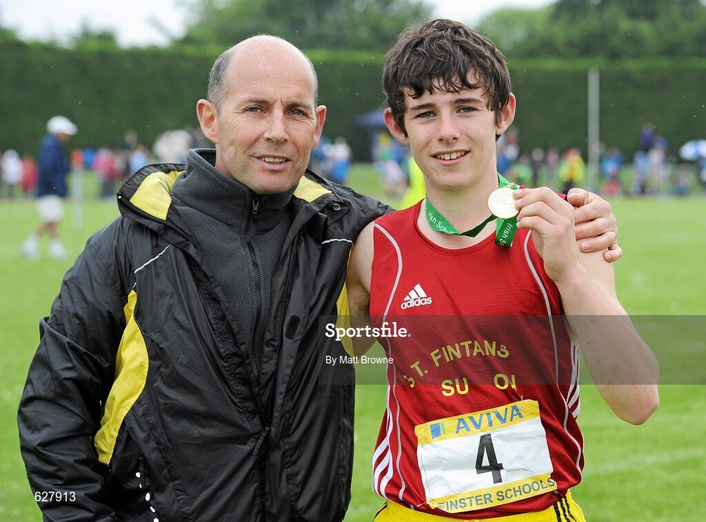 2 June 2012; Gold medal winner Eoin Strutt, St Fintan's High School, Dublin, with his Dad Francis after the Under 16 Boys 1 Mile at the Aviva All Ireland Schools’ Track and Field Championships 2012. Tullamore Harriers AC, Tullamore, Co. Offaly. Picture credit: Matt Browne / SPORTSFILE