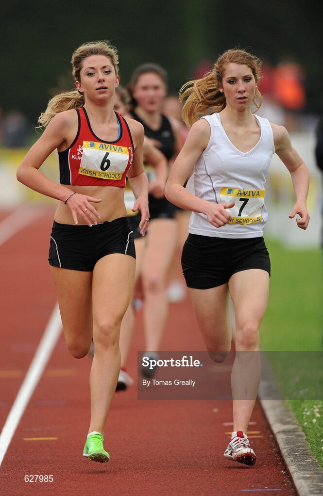 2 June 2012; Eventual winner Lorna Fitzpatrick, Sacred Heart, Newry, Co. Down, right, and eventual second place Amy O'Donoghue, Villers school, Co. Limerick, in action during the Senior Girls 1500m event at the Aviva All Ireland Schools’ Track and Field Championships 2012. Tullamore Harriers AC, Tullamore, Co. Offaly. Picture credit: Tomas Greally / SPORTSFILE