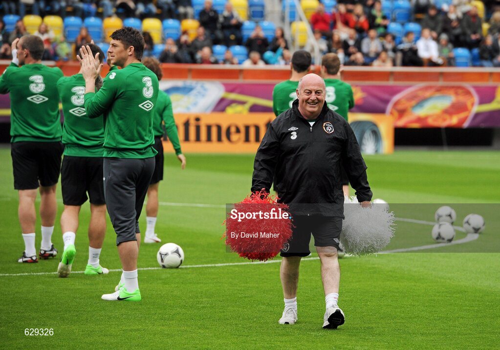 5 June 2012; Republic of Ireland equipment officer Dick Redmond holds cheersleaders pom poms, as the Republic of Ireland team are introduced to the crowd before squad training ahead of UEFA EURO 2012 which begins on June 8th. Republic of Ireland EURO2012 Squad Training, Arka Stadium, Gdynia, Poland. Picture credit: David Maher / SPORTSFILE