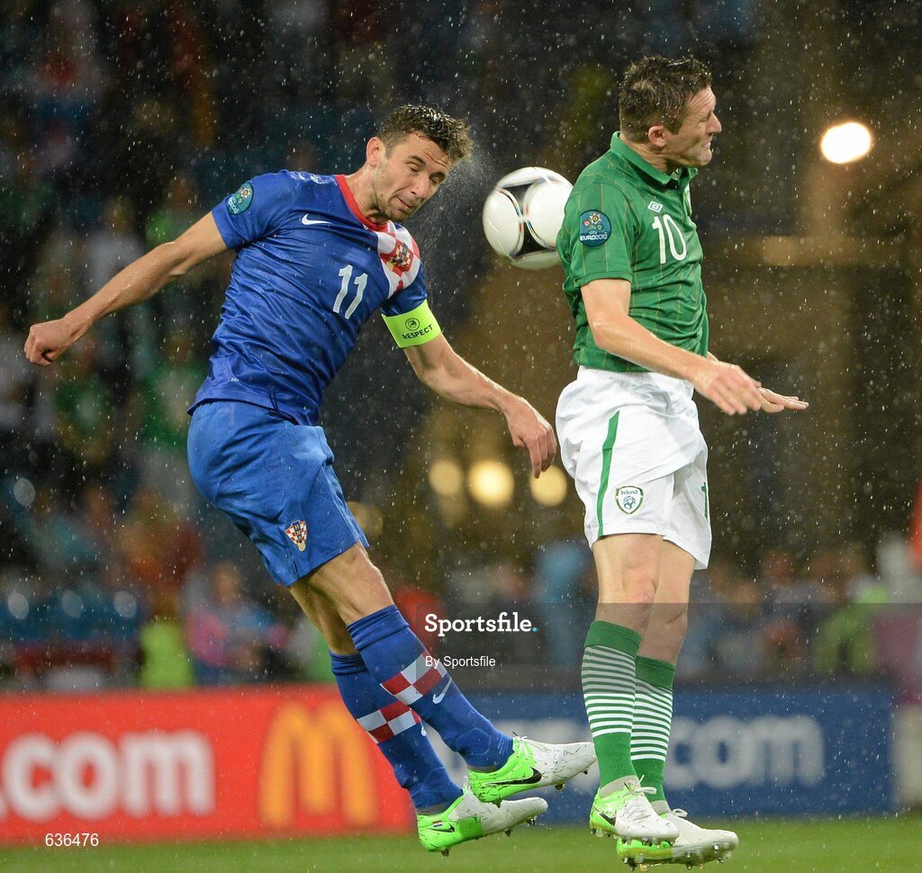 10 June 2012; Robbie Keane, Republic of Ireland, in action against Darijo Srna, Croatia. EURO2012, Group C, Republic of Ireland v Croatia, Municipal Stadium Poznan, Poznan, Poland. Photo by Sportsfile