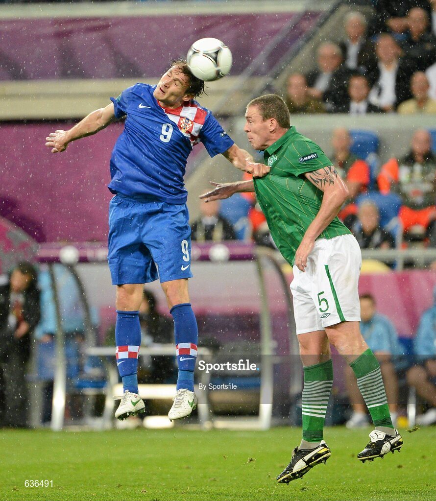 10 June 2012; Nikica Jelavic, Croatia, in action against Richard Dunne, Republic of Ireland. EURO2012, Group C, Republic of Ireland v Croatia, Municipal Stadium Poznan, Poznan, Poland. Photo by Sportsfile