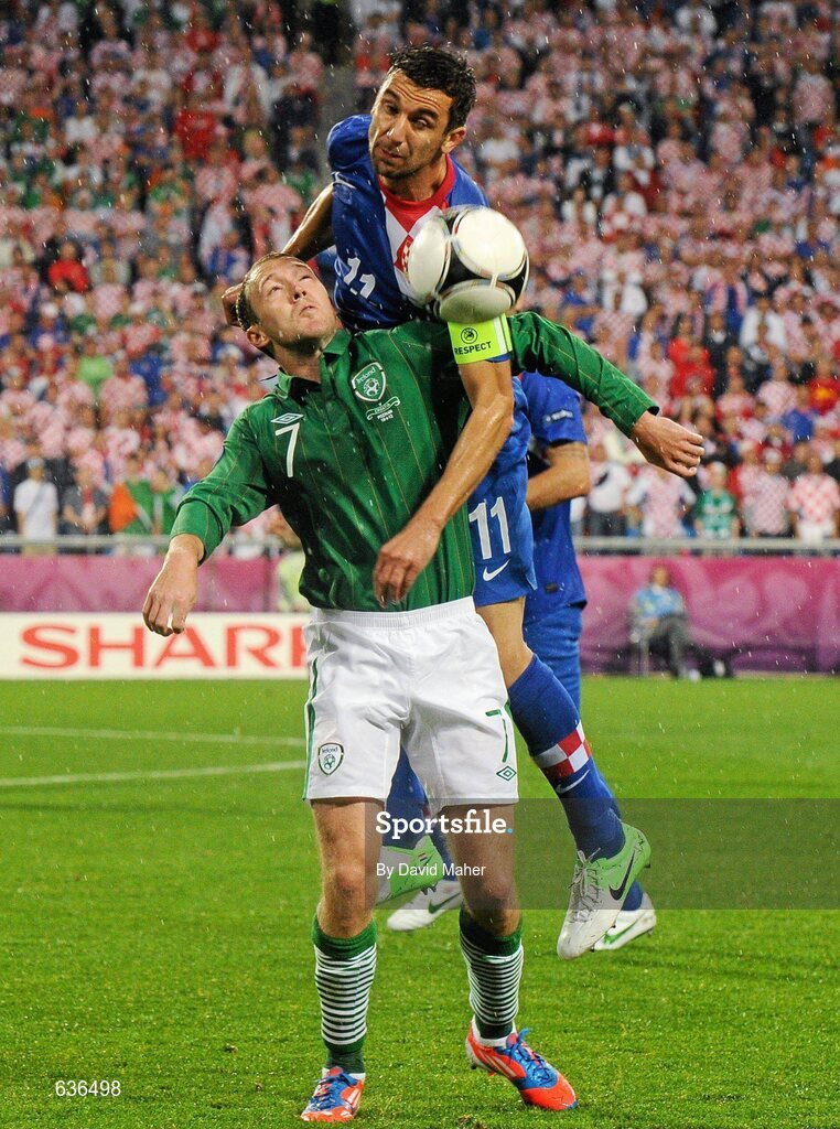10 June 2012; Aiden McGeady, Republic of Ireland, in action against Darijo Srna, Croatia. EURO2012, Group C, Republic of Ireland v Croatia, Municipal Stadium Poznan, Poznan, Poland. Picture credit: David Maher / SPORTSFILE