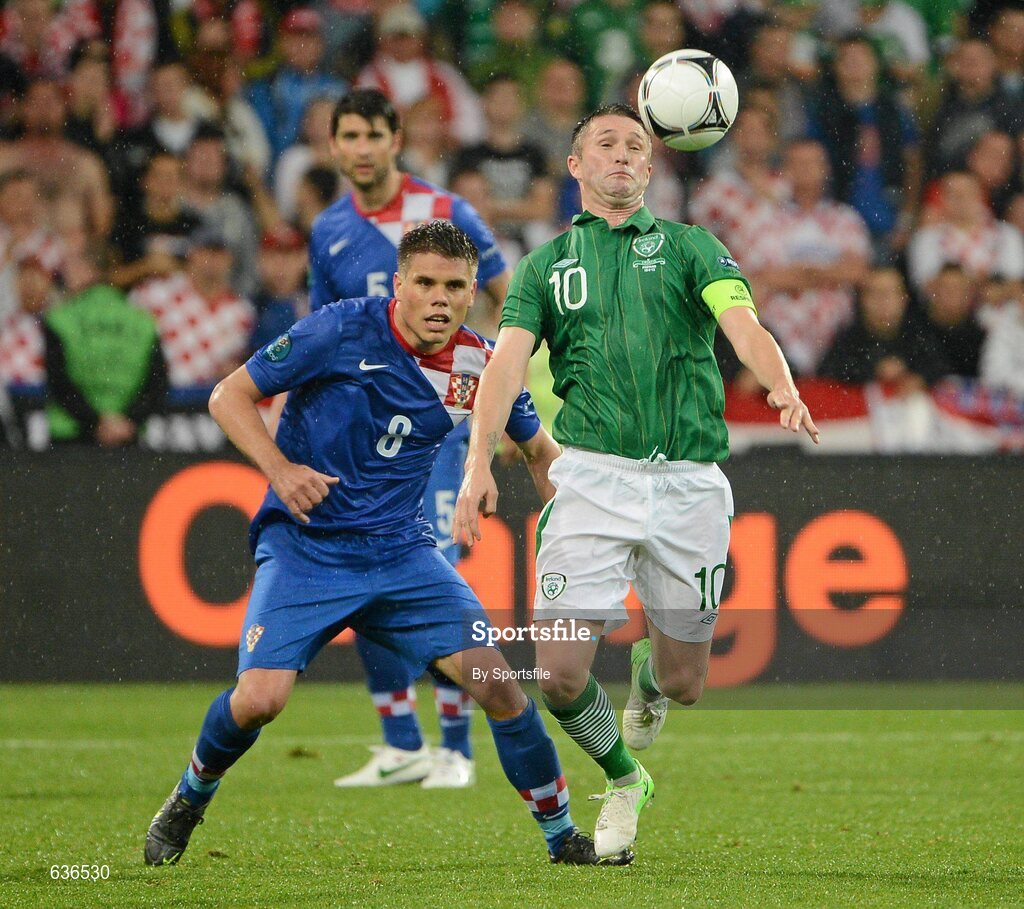 10 June 2012; Robbie Keane, Republic of Ireland, in action against Ognjen Vukojevic, Croatia. EURO2012, Group C, Republic of Ireland v Croatia, Municipal Stadium Poznan, Poznan, Poland. Photo by Sportsfile