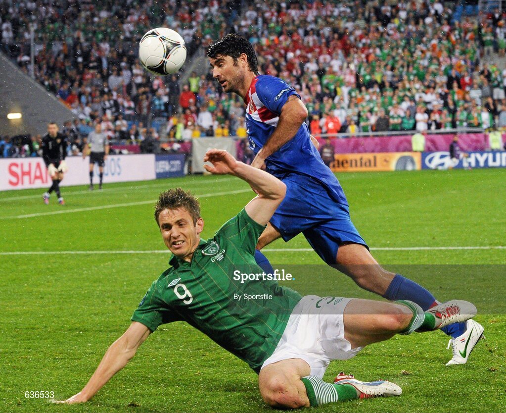 10 June 2012; Kevin Doyle, Republic of Ireland, in action against Vedran Corluka, Croatia. EURO2012, Group C, Republic of Ireland v Croatia, Municipal Stadium Poznan, Poznan, Poland. Photo by Sportsfile