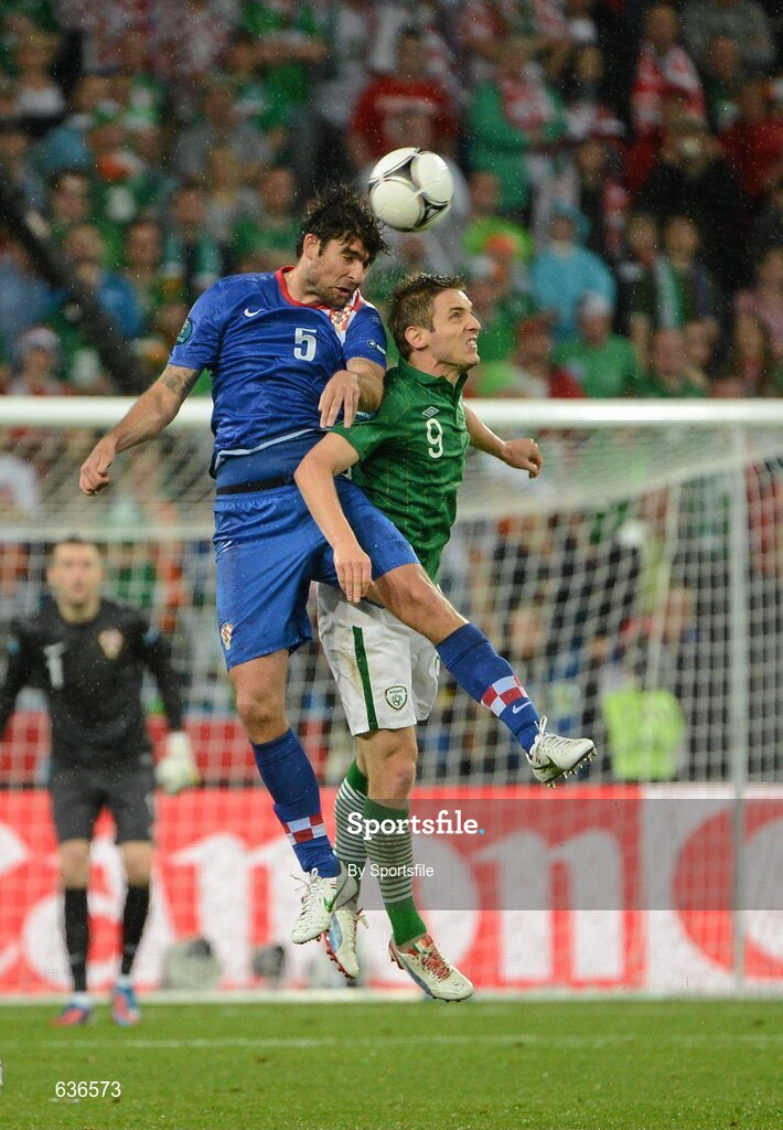 10 June 2012; Vedran Corluka, Croatia, in action against Kevin Doyle, Republic of Ireland. EURO2012, Group C, Republic of Ireland v Croatia, Municipal Stadium Poznan, Poznan, Poland. Photo by Sportsfile