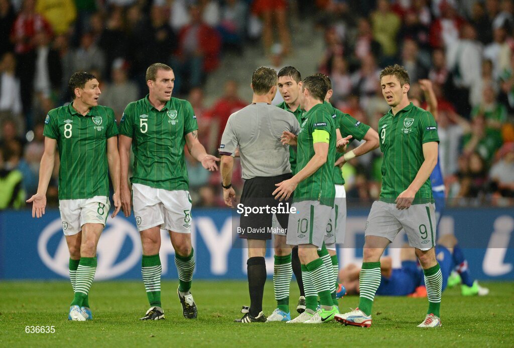 10 June 2012; Republic of Ireland players, from left to right, Keith Andrews, Richard Dunne, Stephen Ward, Robbie Keane and Kevin Doyle remonstrate with referee Björn Kuipers afterNikica Jelavic's scored the second goal for Croatia. EURO2012, Group C, Republic of Ireland v Croatia, Municipal Stadium Poznan, Poznan, Poland. Picture credit: David Maher / SPORTSFILE