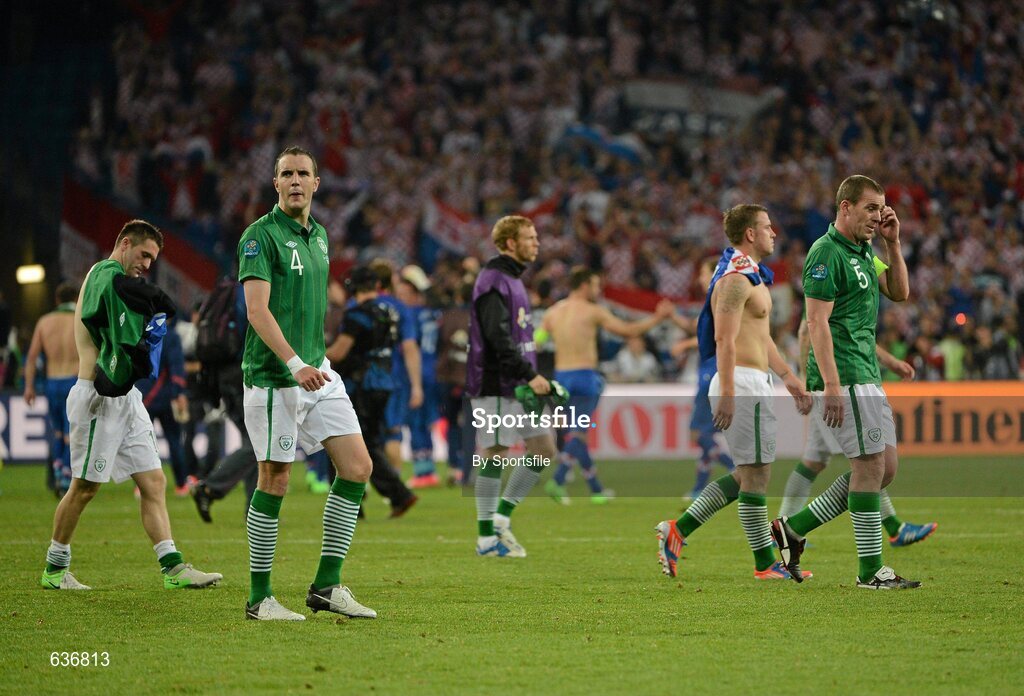 10 June 2012; Republic of Ireland players, including Robbie Keans, John O'Shea and Richard Dunne, leave the field after the game. EURO2012, Group C, Republic of Ireland v Croatia, Municipal Stadium Poznan, Poznan, Poland. Photo by Sportsfile