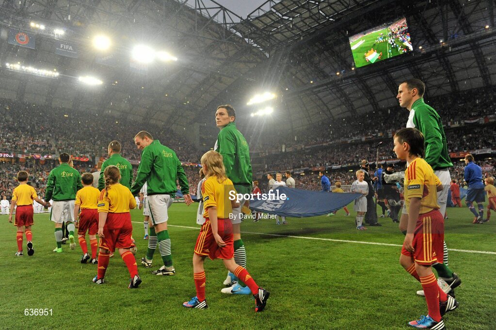 10 June 2012; Republic of Ireland players make their way on to the pitch for the game against Croatia. EURO2012, Group C, Republic of Ireland v Croatia, Municipal Stadium Poznan, Poznan, Poland. Picture credit: David Maher / SPORTSFILE