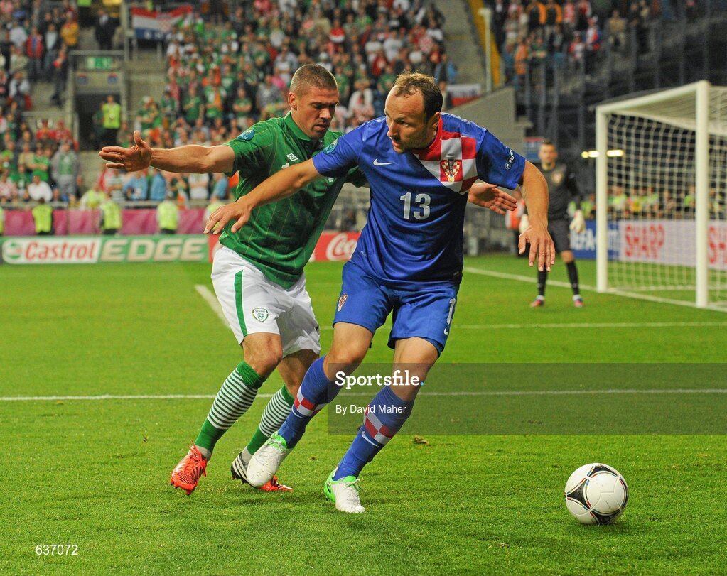10 June 2012; Jonathan Walters, Republic of Ireland, in action against Gordon Schildenfeld, Croatia. EURO2012, Group C, Republic of Ireland v Croatia, Municipal Stadium Poznan, Poznan, Poland. Picture credit: David Maher / SPORTSFILE