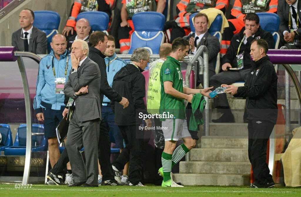 10 June 2012; Robbie Keane, Republic of Ireland, walks past manager Giovanni Trapattoni after been substitued in the second half of the game. EURO2012, Group C, Republic of Ireland v Croatia, Municipal Stadium Poznan, Poznan, Poland. Picture credit: David Maher / SPORTSFILE