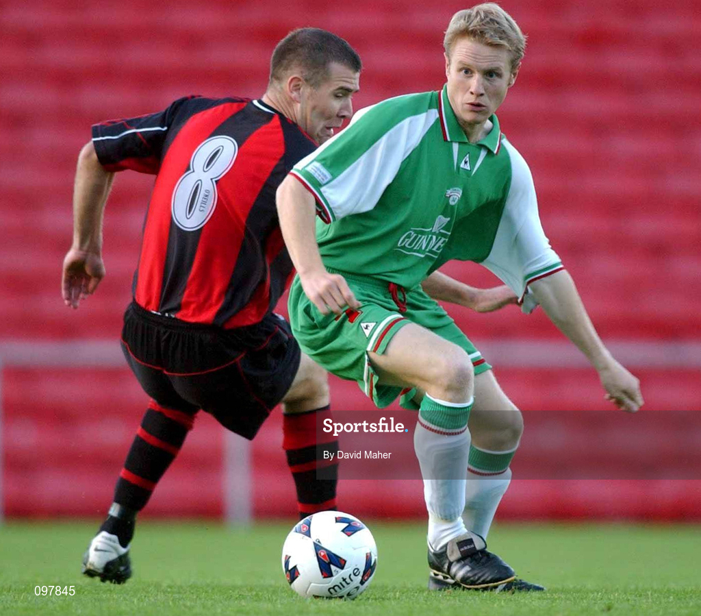 30 August 2002; Colin O'Brien of Cork City in action against Stephen Caffrey of Bohemians during the eircom League Premier Division match between Bohemians and Cork City at Dalymount Park in Dublin. Photo by David Maher/Sportsfile