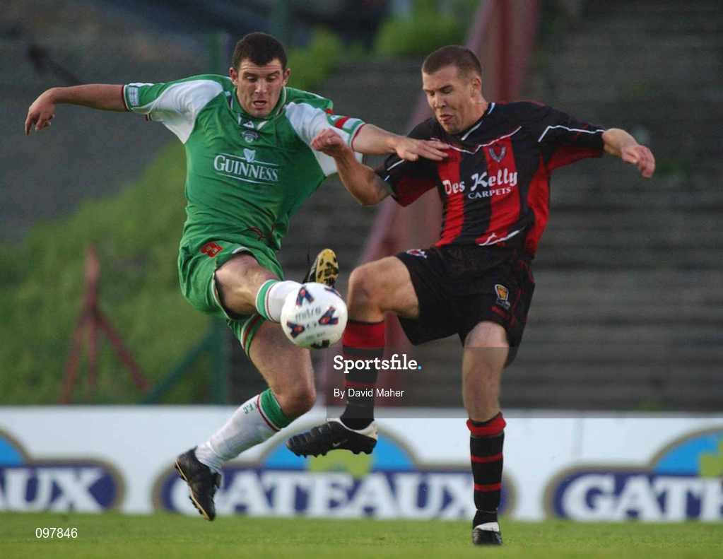 30 August 2002; Greg O'Halloran of Cork City in action against Stephen Caffrey of Bohemians during the eircom League Premier Division match between Bohemians and Cork City at Dalymount Park in Dublin. Photo by David Maher/Sportsfile