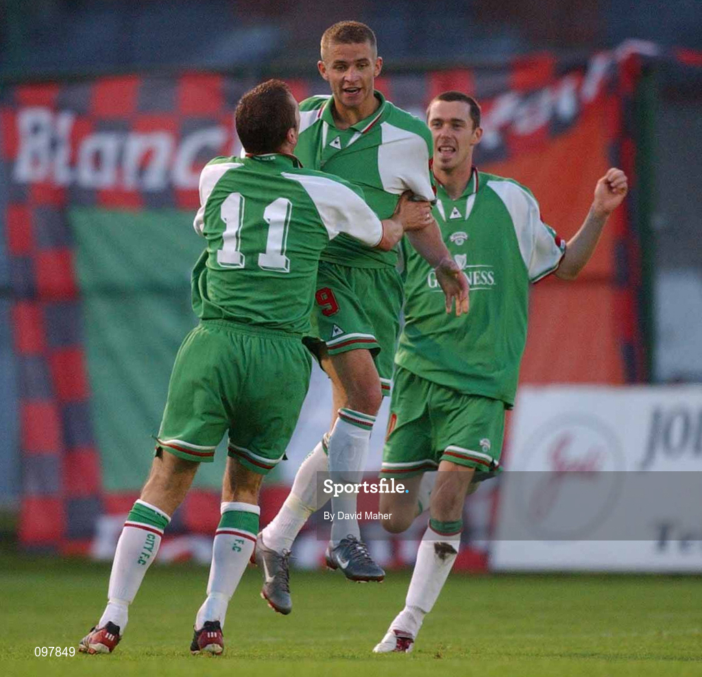 30 August 2002; John O'Flynn, centre, of Cork City, celebrates with team-mates Billy Woods and George O'Callaghan after scoring his side's first goal during the eircom League Premier Division match between Bohemians and Cork City at Dalymount Park in Dublin. Photo by David Maher/Sportsfile