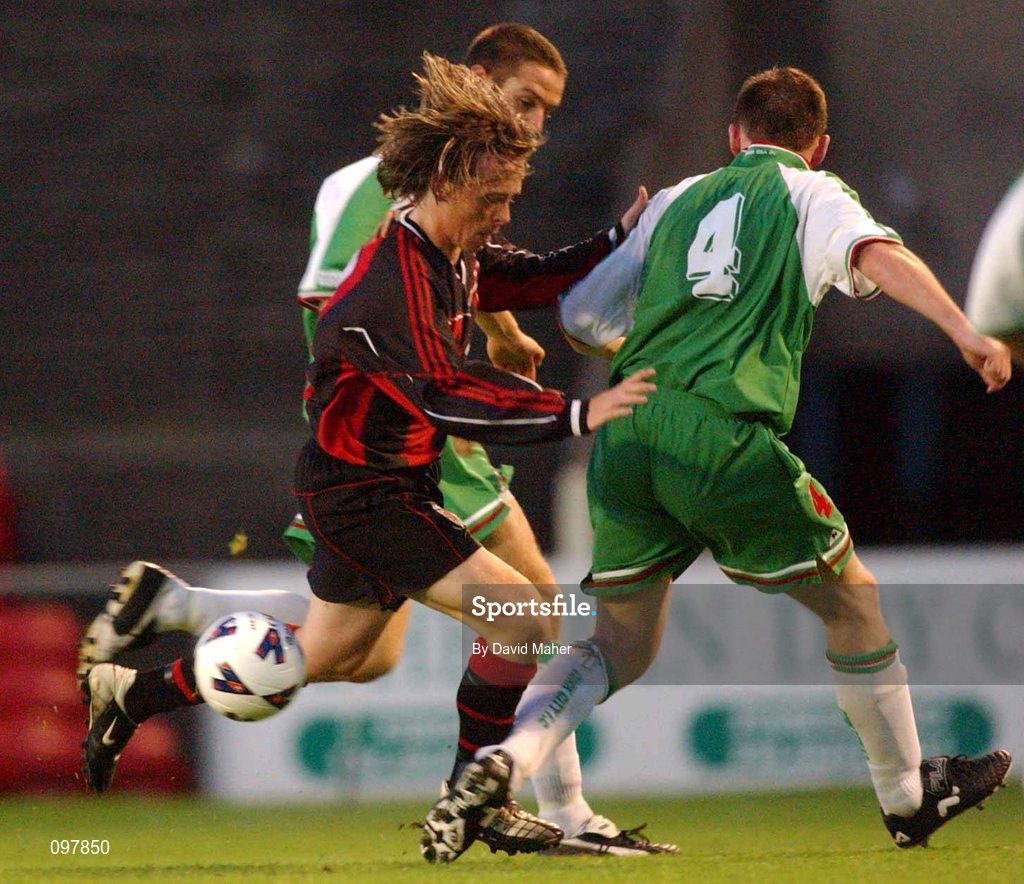 30 August 2002; Bobby Ryan of Bohemians in action against Gareth Cronin and Alan Carey of Cork City during the eircom League Premier Division match between Bohemians and Cork City at Dalymount Park in Dublin. Photo by David Maher/Sportsfile