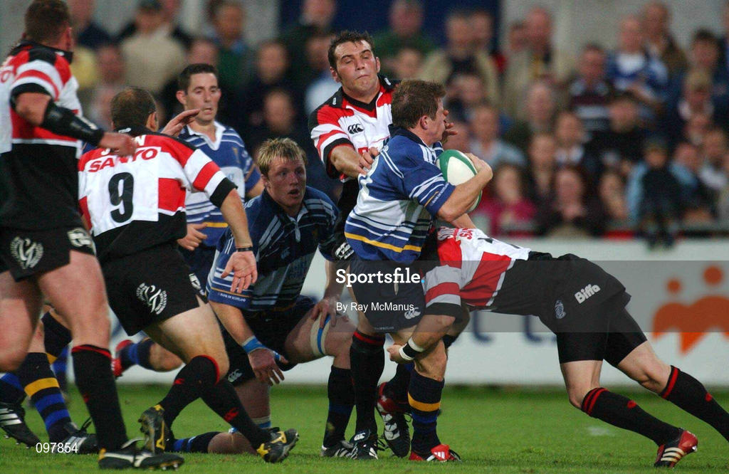 30 August 2002; Andy Dunne of Leinster is tackled by Ceri Sweeney of Pontypridd during the Celtic League Pool B match between Leinster and Pontypridd at Donnybrook Stadium in Dublin. Photo by Ray McManus/Sportsfile