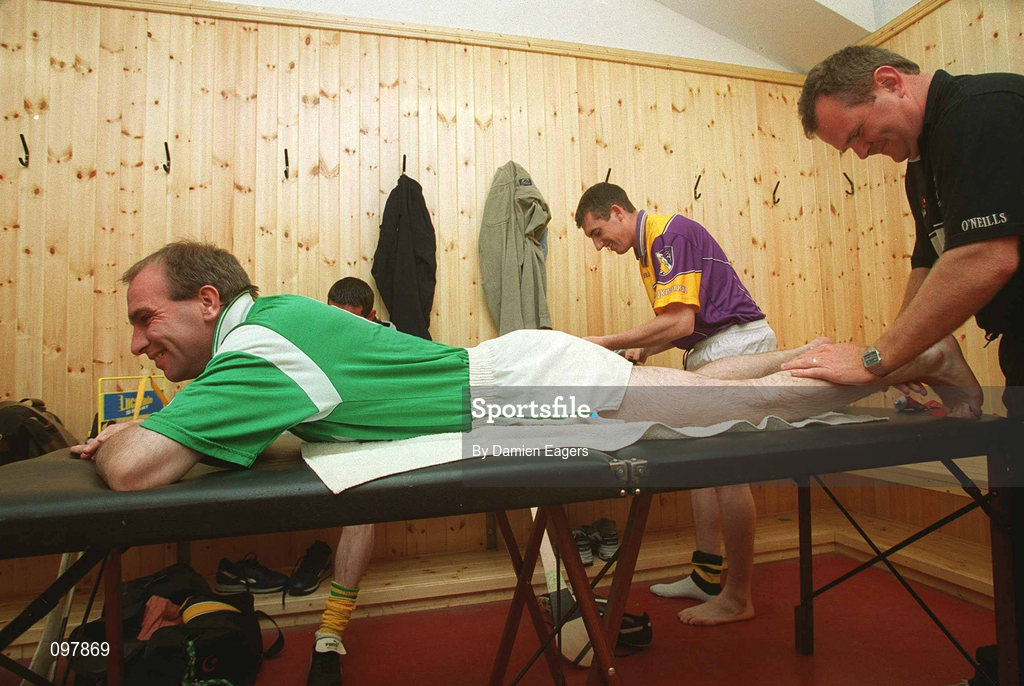 30 August 2002; DJ Carey receives some light treatment from Joe Malone during a Kilkenny hurling press night prior to their All-Ireland Hurling Final against Clare. Photo by Damien Eagers/Sportsfile