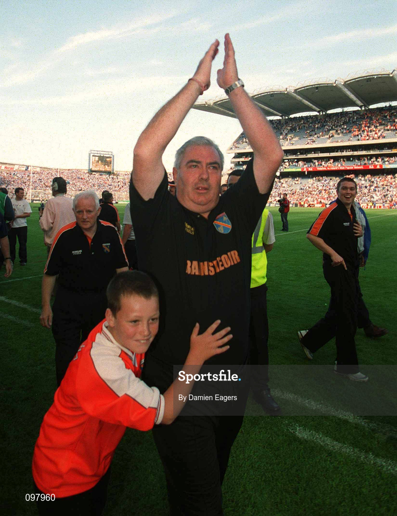1 September 2002; Armagh manager Joe Kernan celebrates with his son Ross following his side's victory in the Bank of Ireland All-Ireland Senior Football Championship Semi-Final match between Armagh and Dublin at Croke Park in Dublin. Photo by Damien Eagers/Sportsfile