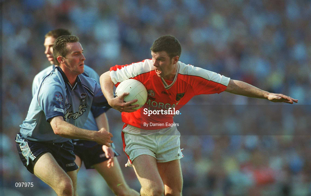 1 September 2002; Ronan Clarke of Armagh is tackled by Paddy Christie of Dublin during the Bank of Ireland All-Ireland Senior Football Championship Semi-Final match between Armagh and Dublin at Croke Park in Dublin. Photo by Damien Eagers/Sportsfile