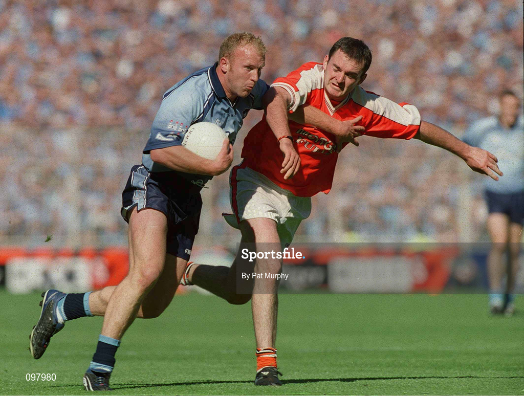 1 September 2002; Shane Ryan of Dublin is tackled by Aidan O'Rourke of Armagh during the Bank of Ireland All-Ireland Senior Football Championship Semi-Final match between Armagh and Dublin at Croke Park in Dublin. Photo by Pat Murphy/Sportsfile