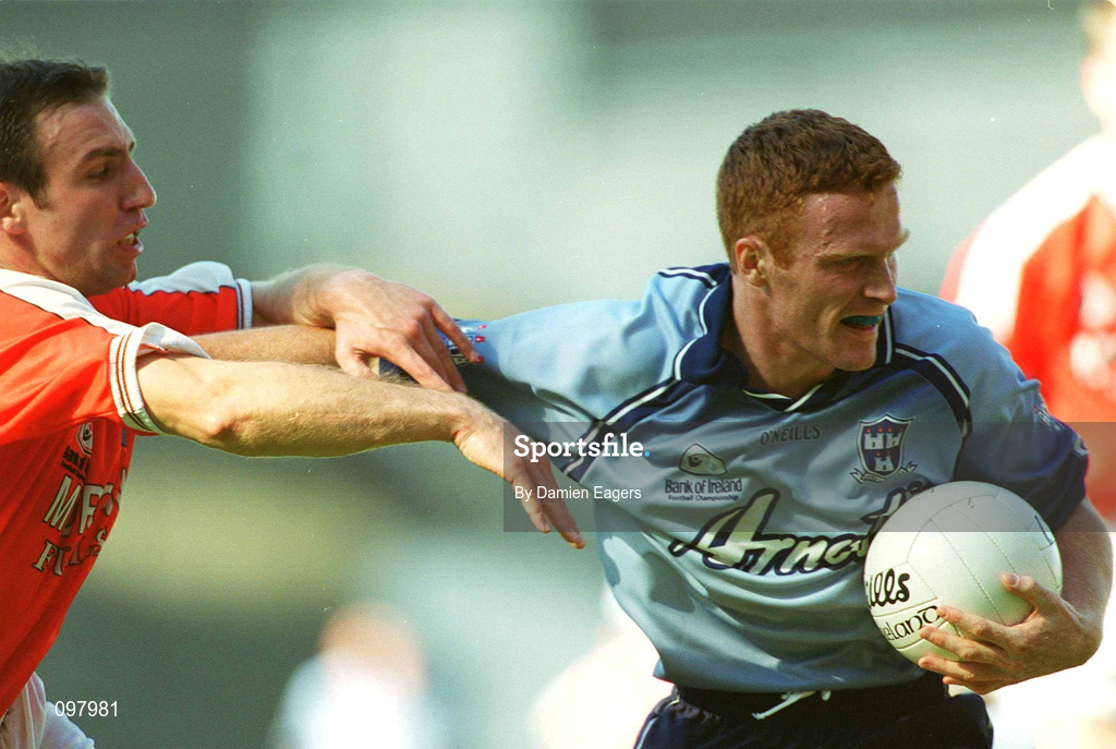 1 September 2002; Peadar Andrews of Dublin is tackled by Enda McNulty of Armagh during the Bank of Ireland All-Ireland Senior Football Championship Semi-Final match between Armagh and Dublin at Croke Park in Dublin. Photo by Damien Eagers/Sportsfile