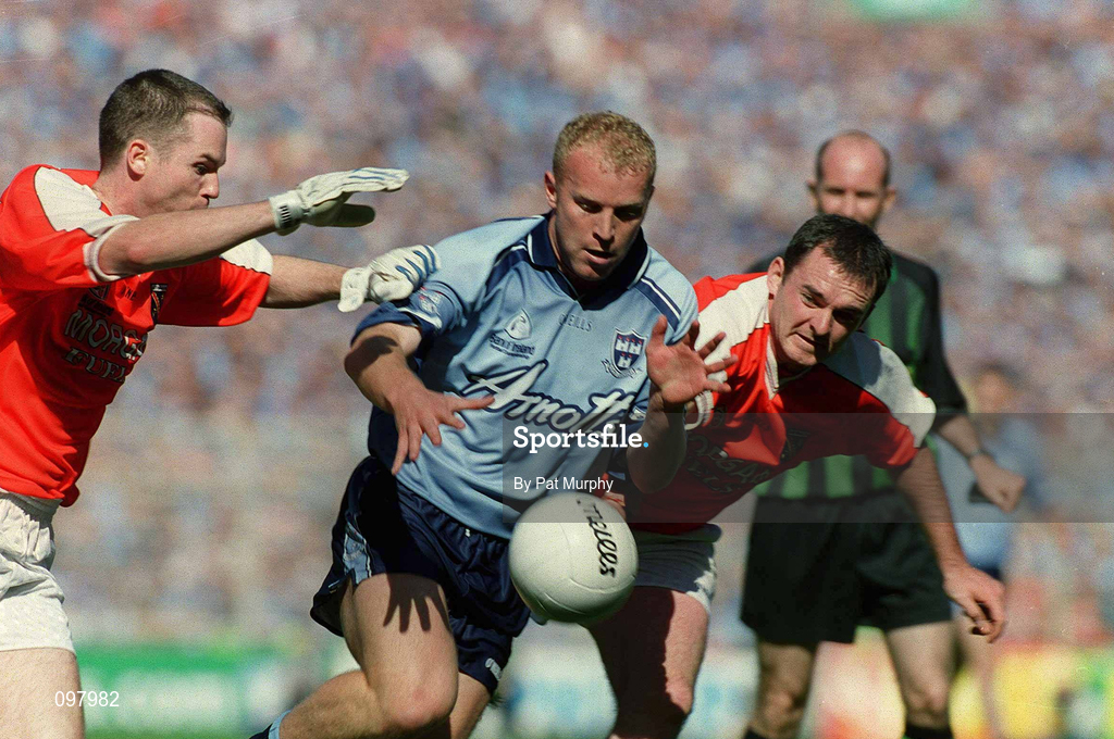 1 September 2002; Shane Ryan of Dublin is tackled by John McEntee, left, and Aidan O'Rourke of Armagh during the Bank of Ireland All-Ireland Senior Football Championship Semi-Final match between Armagh and Dublin at Croke Park in Dublin. Photo by Pat Murphy/Sportsfile