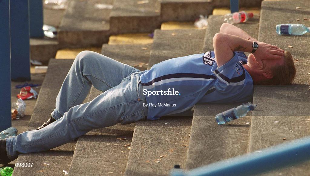 1 September 2002; A disconsolate Dublin supporter on Hill 16 following his side's defeat in the Bank of Ireland All-Ireland Senior Football Championship Semi-Final match between Armagh and Dublin at Croke Park in Dublin. Photo by Ray McManus/Sportsfile