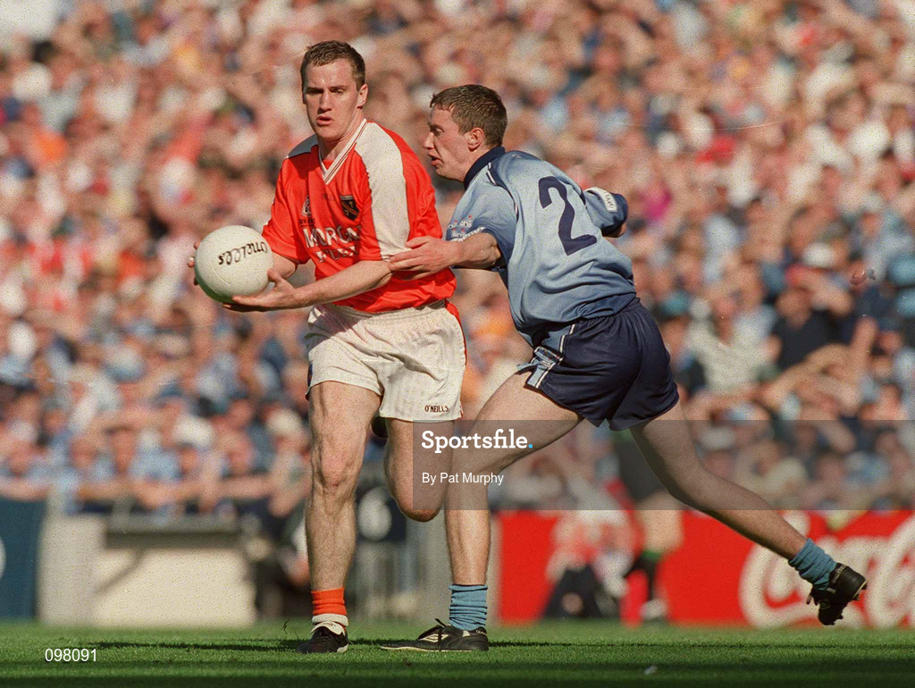 1 September 2002; John McEntee of Armagh in action against Barry Cahill of Dublin during the Bank of Ireland All-Ireland Senior Football Championship Semi-Final match between Armagh and Dublin at Croke Park in Dublin. Photo by Pat Murphy/Sportsfile