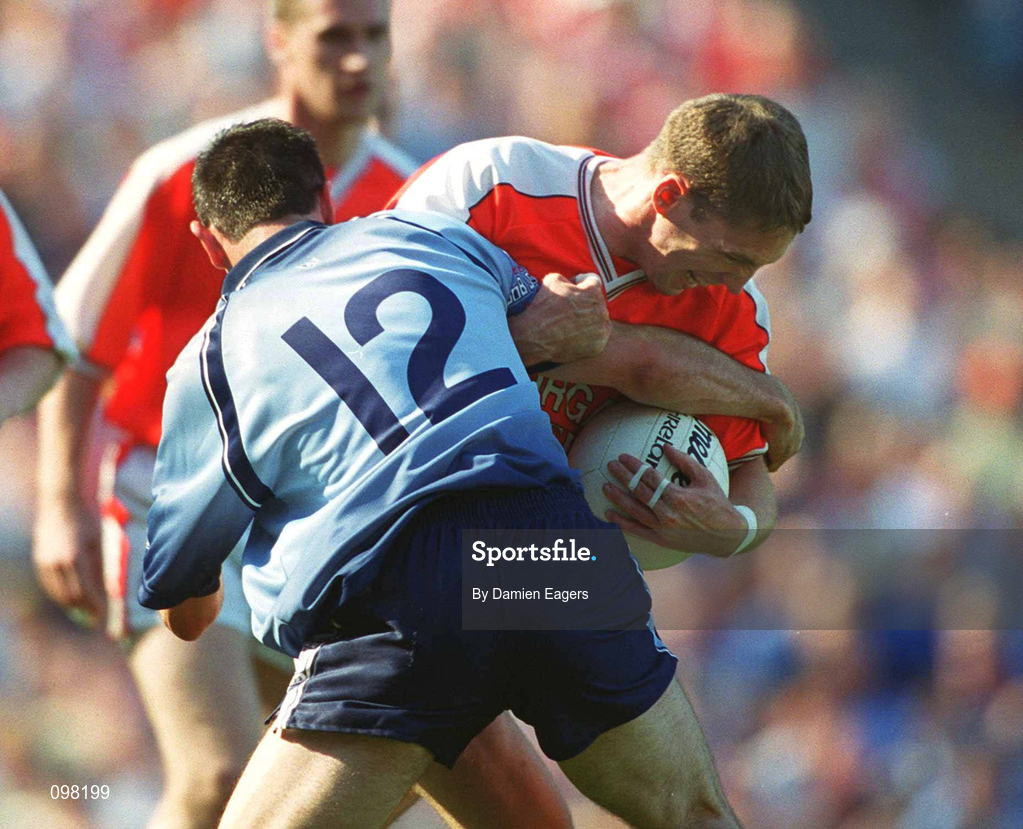 1 September 2002; Kieran McGeeney of Armagh in action against John McNally of Dublin during the Bank of Ireland All-Ireland Senior Football Championship Semi-Final match between Armagh and Dublin at Croke Park in Dublin. Photo by Damien Eagers/Sportsfile