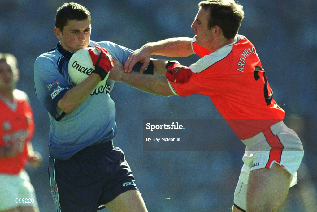 1 September 2002; Alan Brogan of Dublin is tackled by Enda McNulty of Armagh during the Bank of Ireland All-Ireland Senior Football Championship Semi-Final match between Armagh and Dublin at Croke Park in Dublin. Photo by Ray McManus/Sportsfile