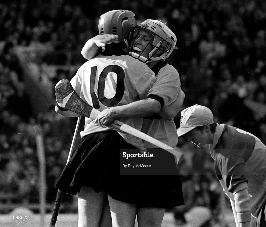 23 September 1990; Angela Downey, right, celebrates with Kilkenny team-mate Breda Holmes after scoring her side's first goal during the All-Ireland Senior Camogie Championship Final match between Kilkenny and Wexford at Croke Park in Dublin. Photo by Ray McManus/Sportsfile