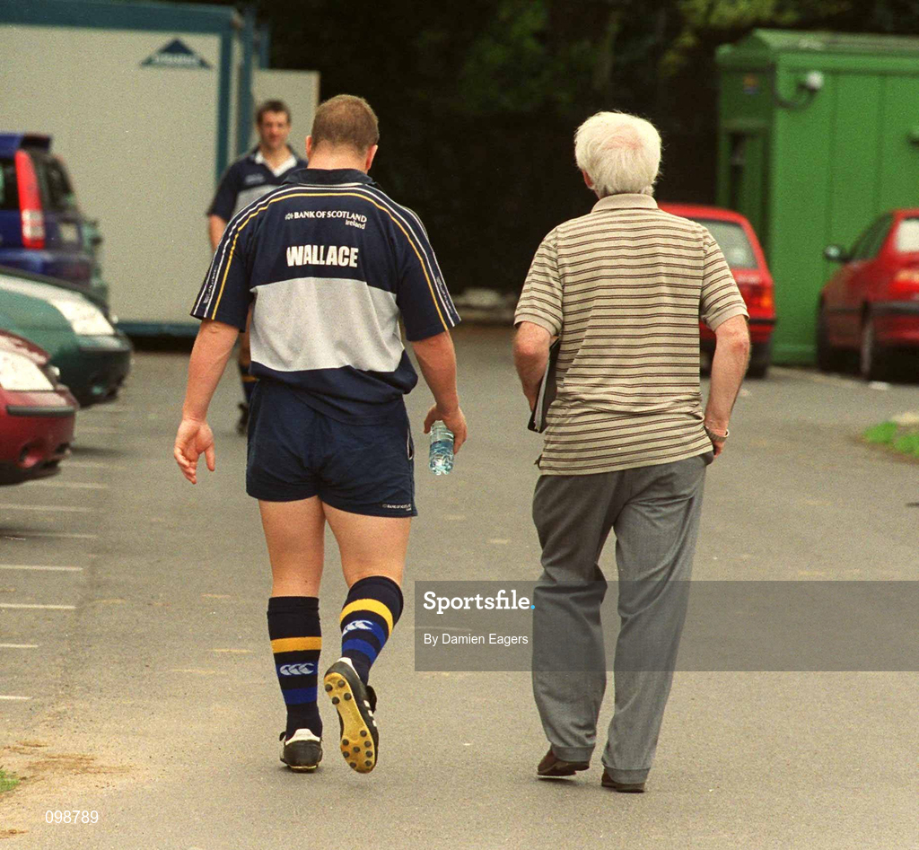 27 August 2002; Al Guy, Irish Sports Council, leads Paul Wallace for drug testing following Leinster rugby squad training at UCD in Dublin. Photo by Damien Eagers/Sportsfile