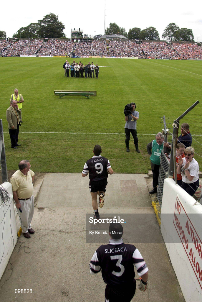 18 August 2002; The Sligo team, led by captain Eamonn O'Hara, 9, make their way out onto the pitch prior to the Bank of Ireland All-Ireland Senior Football Championship Quarter-Final Replay match between Armagh and Sligo at Páirc Táilteann in Navan, Meath. Photo by Brendan Moran/Sportsfile