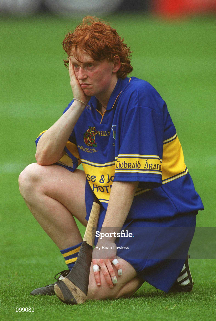 15 September 2002; Deirdre Hughes of Tipperary dejected following her side's defeat in the All-Ireland Senior Camogie Championship Final match between Cork and Tipperary at Croke Park in Dublin. Photo by Brian Lawless/Sportsfile