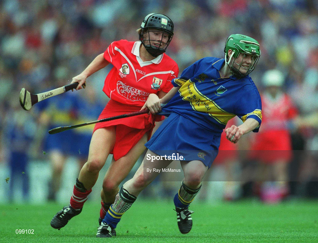 15 September 2002; Emer McDonnell of Tipperary is tackled by Stephanie Dunlea of Cork during the All-Ireland Senior Camogie Championship Final match between Cork and Tipperary at Croke Park in Dublin. Photo by Ray McManus/Sportsfile