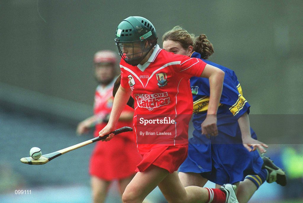 15 September 2002; Gemma O'Connor of Cork is tackled by Therese Broph of Tipperary during the All-Ireland Senior Camogie Championship Final match between Cork and Tipperary at Croke Park in Dublin. Photo by Brian Lawless/Sportsfile