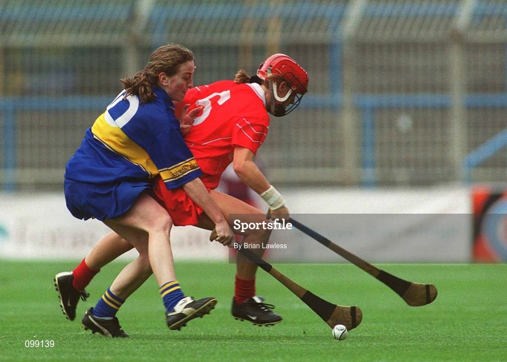 15 September 2002; Mary O'Connor of Cork in action against Philly Fogarty of Tipperary during the All-Ireland Senior Camogie Championship Final match between Cork and Tipperary at Croke Park in Dublin. Photo by Brian Lawless/Sportsfile