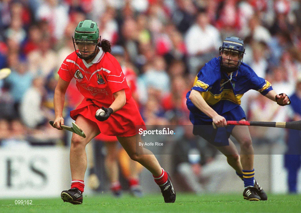 15 September 2002; Caoimhe Harrington of Cork in action against Paula Bulfin of Tipperary during the All-Ireland Senior Camogie Championship Final match between Cork and Tipperary at Croke Park in Dublin. Photo by Aoife Rice/Sportsfile