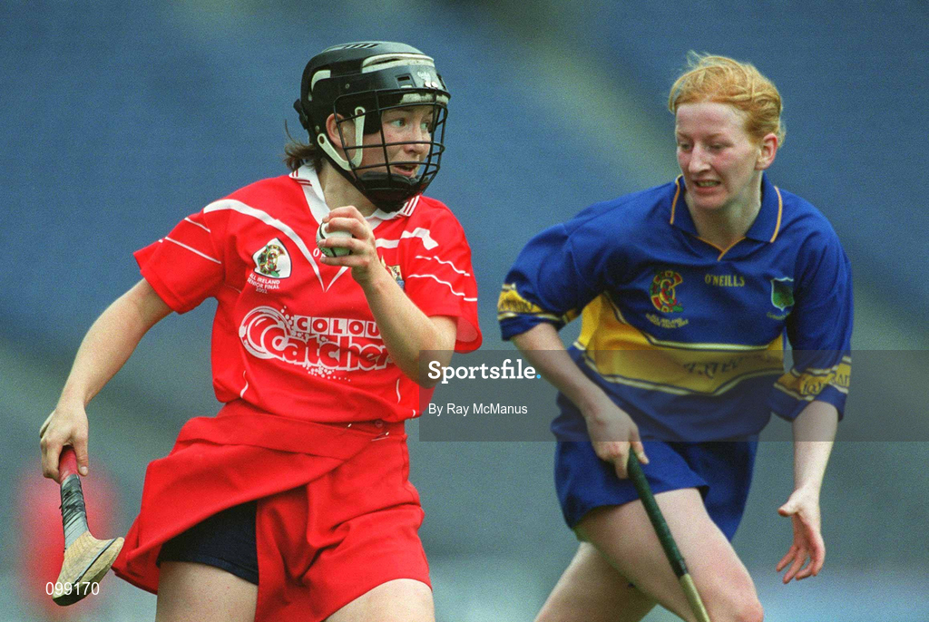 15 September 2002; Una O'Donoghue of Cork in action against Therese Brophy of Tipperary during the All-Ireland Senior Camogie Championship Final match between Cork and Tipperary at Croke Park in Dublin. Photo by Ray McManus/Sportsfile