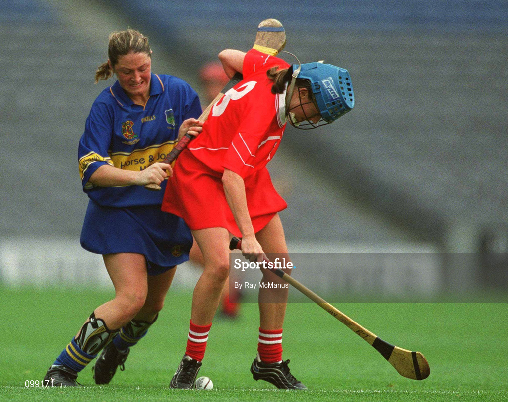 15 September 2002; Vivienne Harris of Cork in action against Angie McDermott of Tipperary during the All-Ireland Senior Camogie Championship Final match between Cork and Tipperary at Croke Park in Dublin. Photo by Ray McManus/Sportsfile
