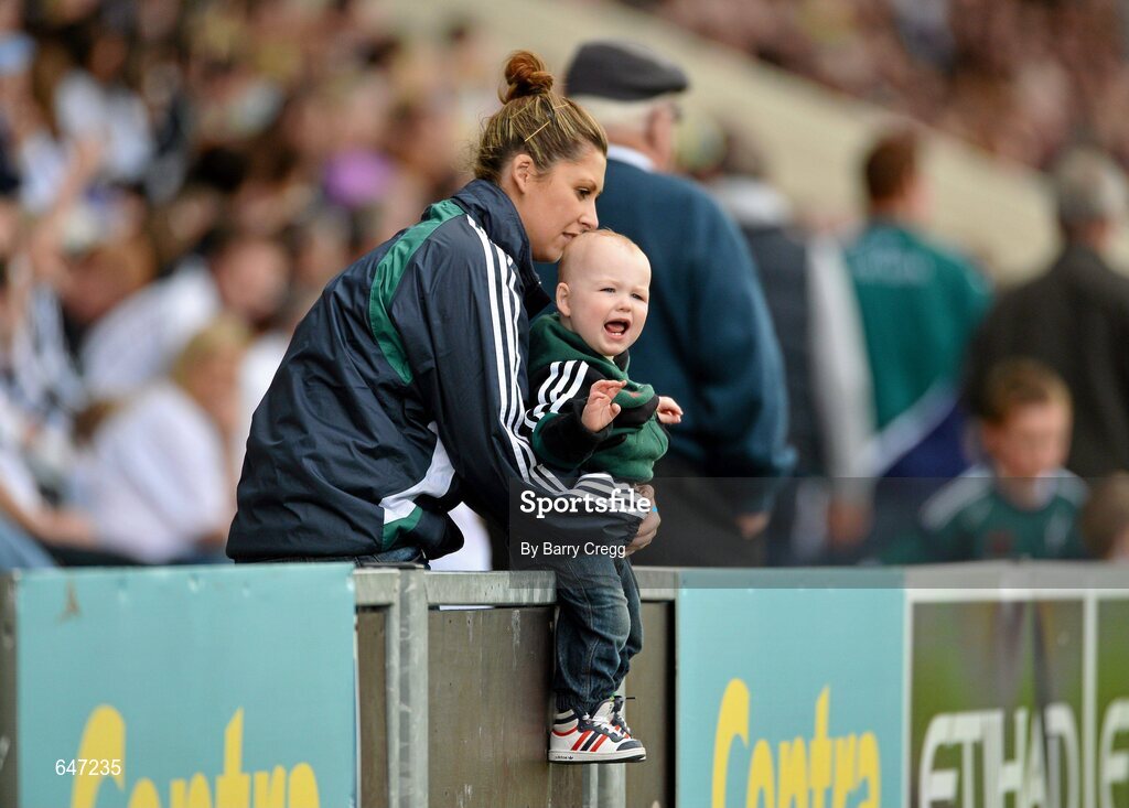 17 June 2012; Joshua Bourke, aged 16 months, from Kildare, cheers on his team with his mother Debbie Kelly during the game. Leinster GAA Football Senior Championship Quarter-Final, Offaly v Kildare, O'Moore Park, Portlaoise, Co. Laois. Picture credit: Barry Cregg / SPORTSFILE