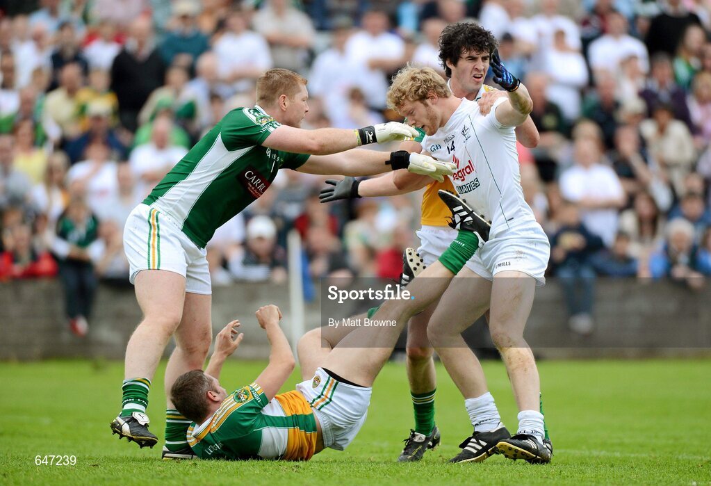 17 June 2012; Tomas O'Connor, Kildare, tussels with Offaly players, from left, Alan Mulhall, Shane Sullivan and Richie Dalton. Leinster GAA Football Senior Championship Quarter-Final, Offaly v Kildare, O'Moore Park, Portlaoise, Co. Laois. Picture credit: Matt Browne / SPORTSFILE