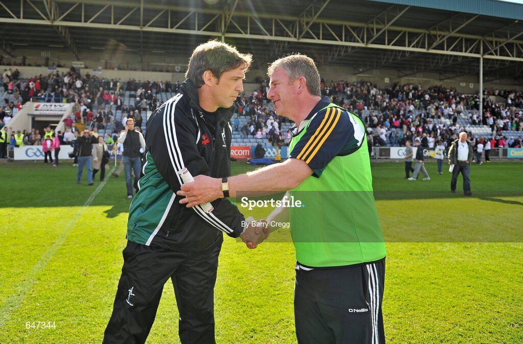 17 June 2012; Kildare manager Kieran McGeeney, left, shakes hands with Offaly manager Tom Coffey after the game. Leinster GAA Football Senior Championship Quarter-Final, Offaly v Kildare, O'Moore Park, Portlaoise, Co. Laois. Picture credit: Barry Cregg / SPORTSFILE