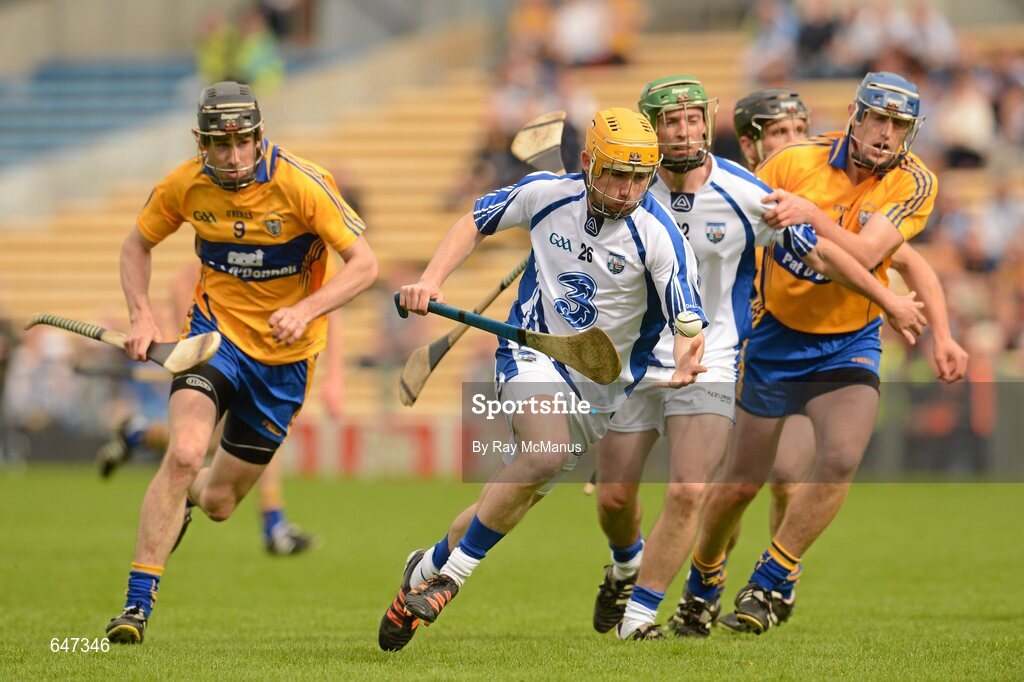 17 June 2012; Thomas Ryan, Waterford, races clear of  Clare's Patrick Donnellan. Munster GAA Hurling Senior Championship Semi-Final, Clare v Waterford, Semple Stadium, Thurles, Co. Tipperary. Picture credit: Ray McManus / SPORTSFILE