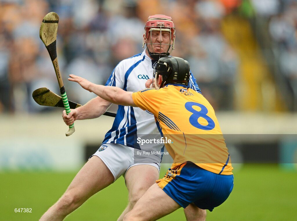 17 June 2012; John Mullane, Waterford, is tackled by Nicky O'Connell, Clare. Munster GAA Hurling Senior Championship Semi-Final, Clare v Waterford, Semple Stadium, Thurles, Co. Tipperary. Picture credit: Ray McManus / SPORTSFILE