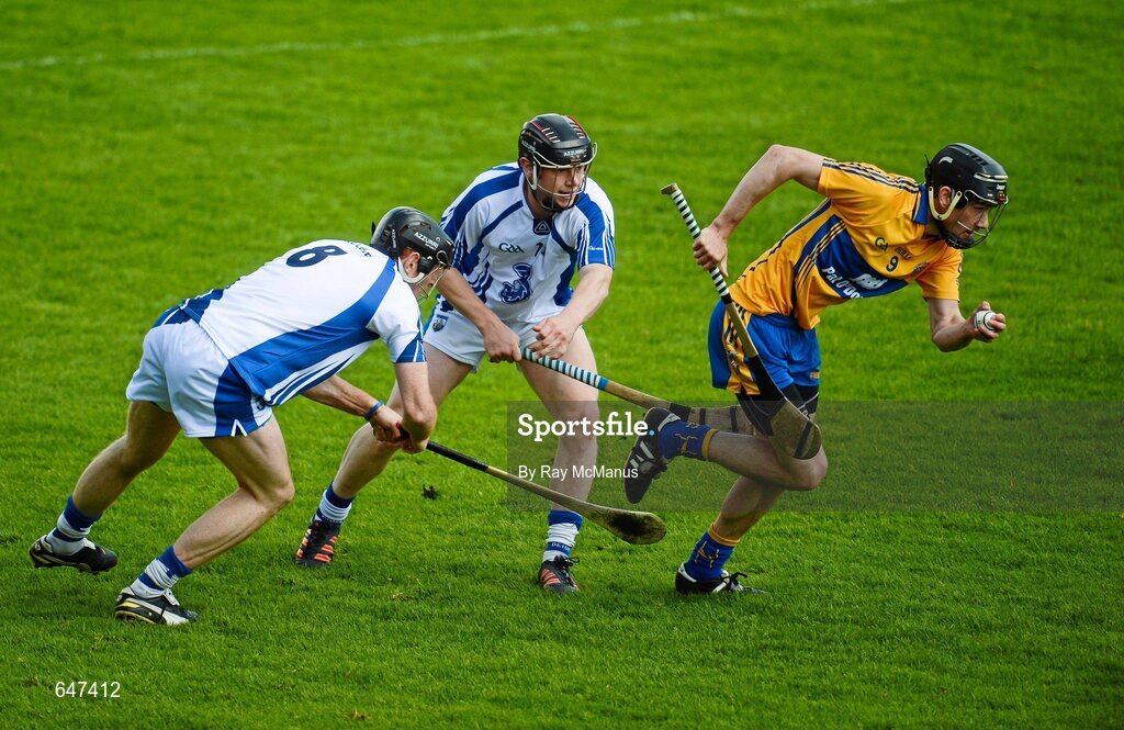 17 June 2012; Patrick Donnellan, Clare, is tackled by Philip Mahoney and Kevin Moran, Waterford. Munster GAA Hurling Senior Championship Semi-Final, Clare v Waterford, Semple Stadium, Thurles, Co. Tipperary. Picture credit: Ray McManus / SPORTSFILE